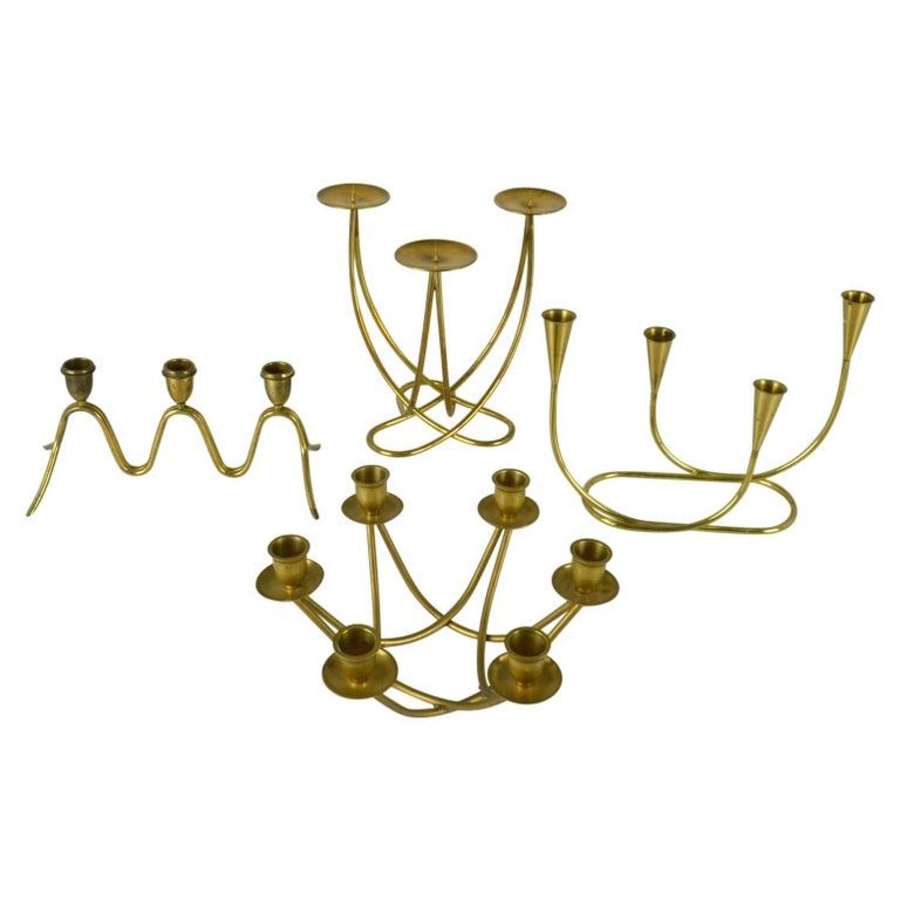 Group of Four Brass Candelabras