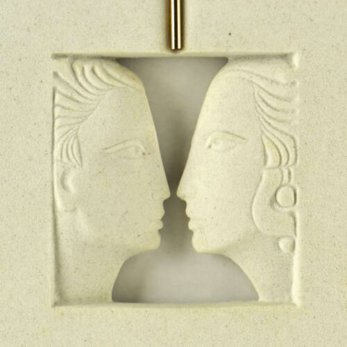 Wall Relief Silhouette Faces Carved in Stone